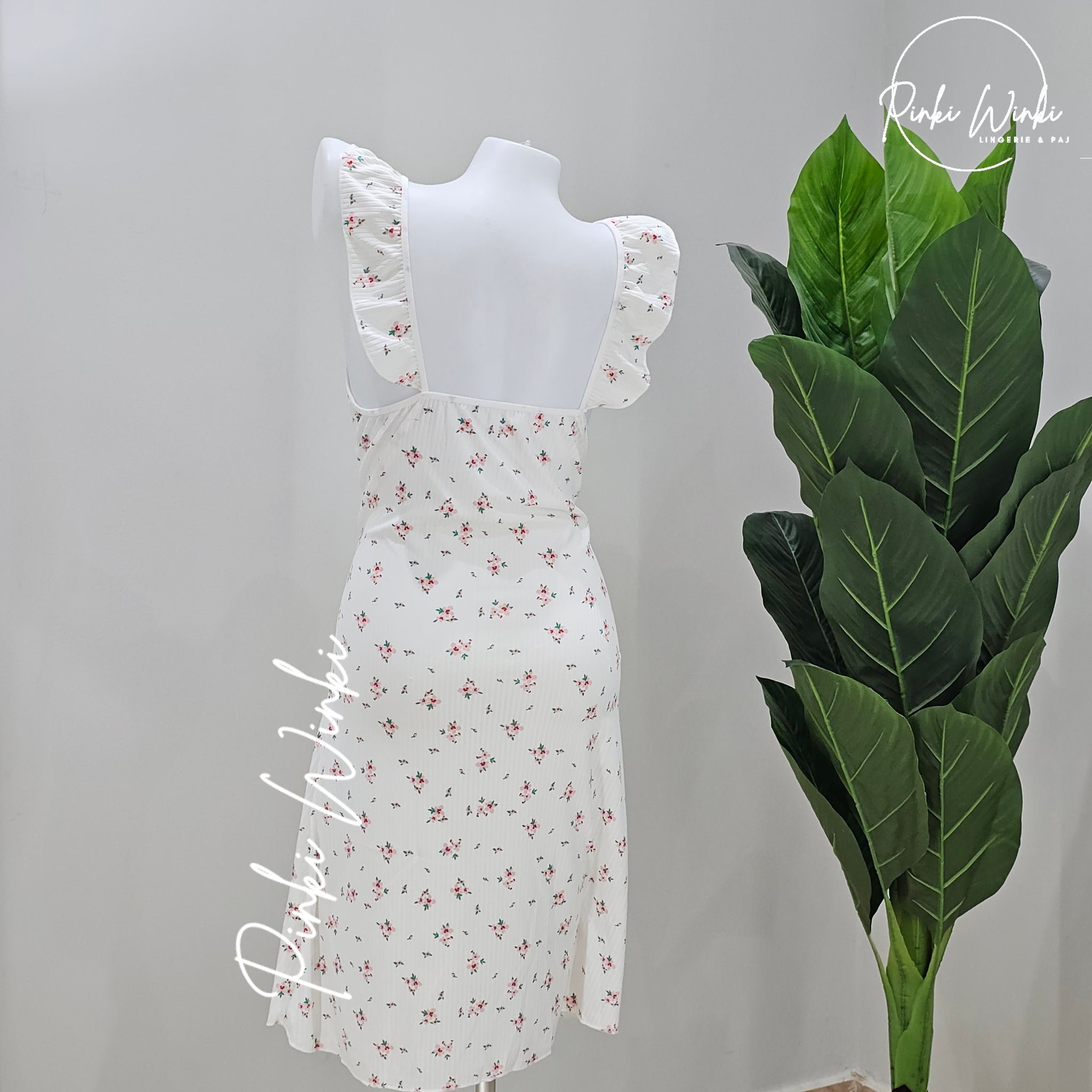 فستان بأكتاف كشكشة بطبعة زهور