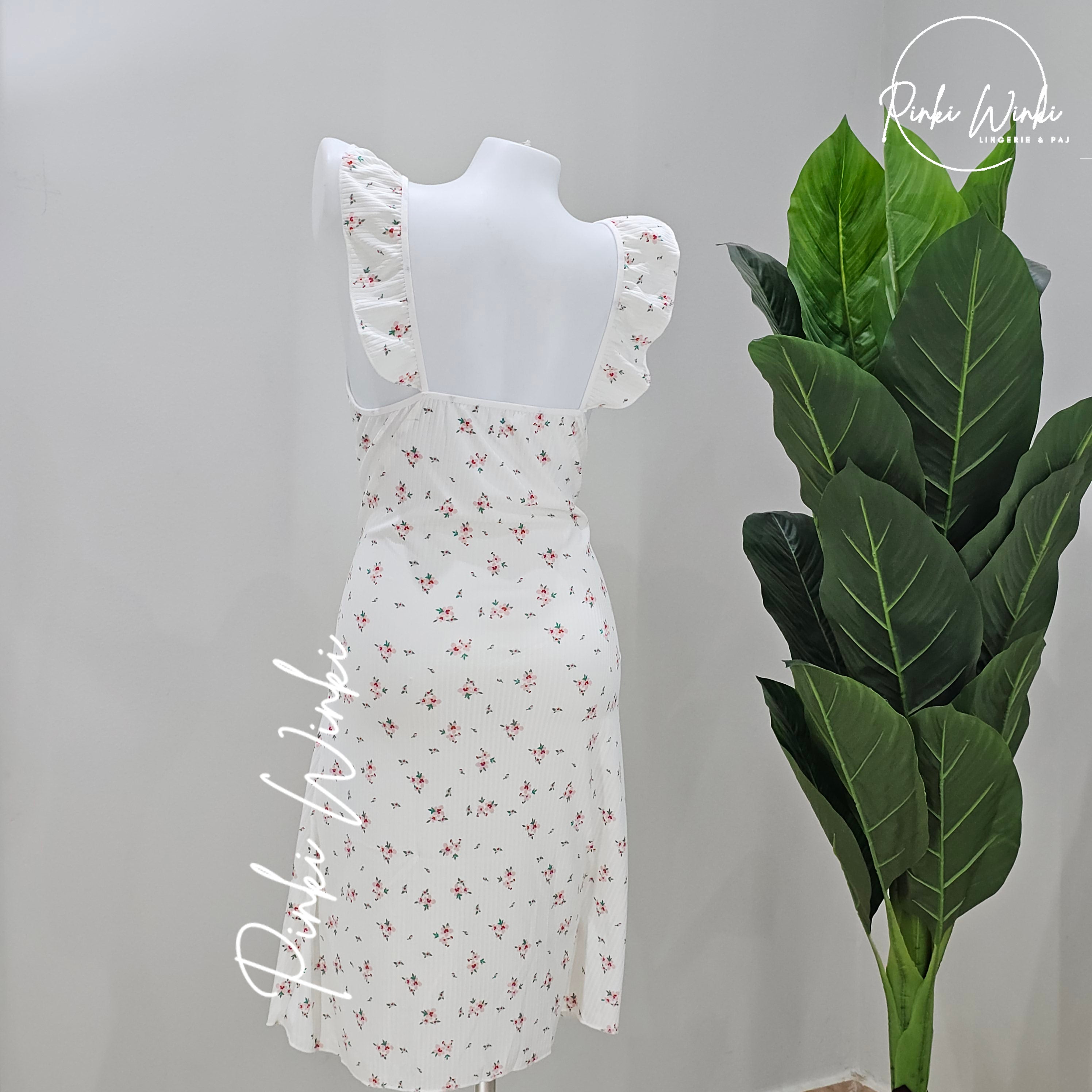 فستان بأكتاف كشكشة بطبعة زهور